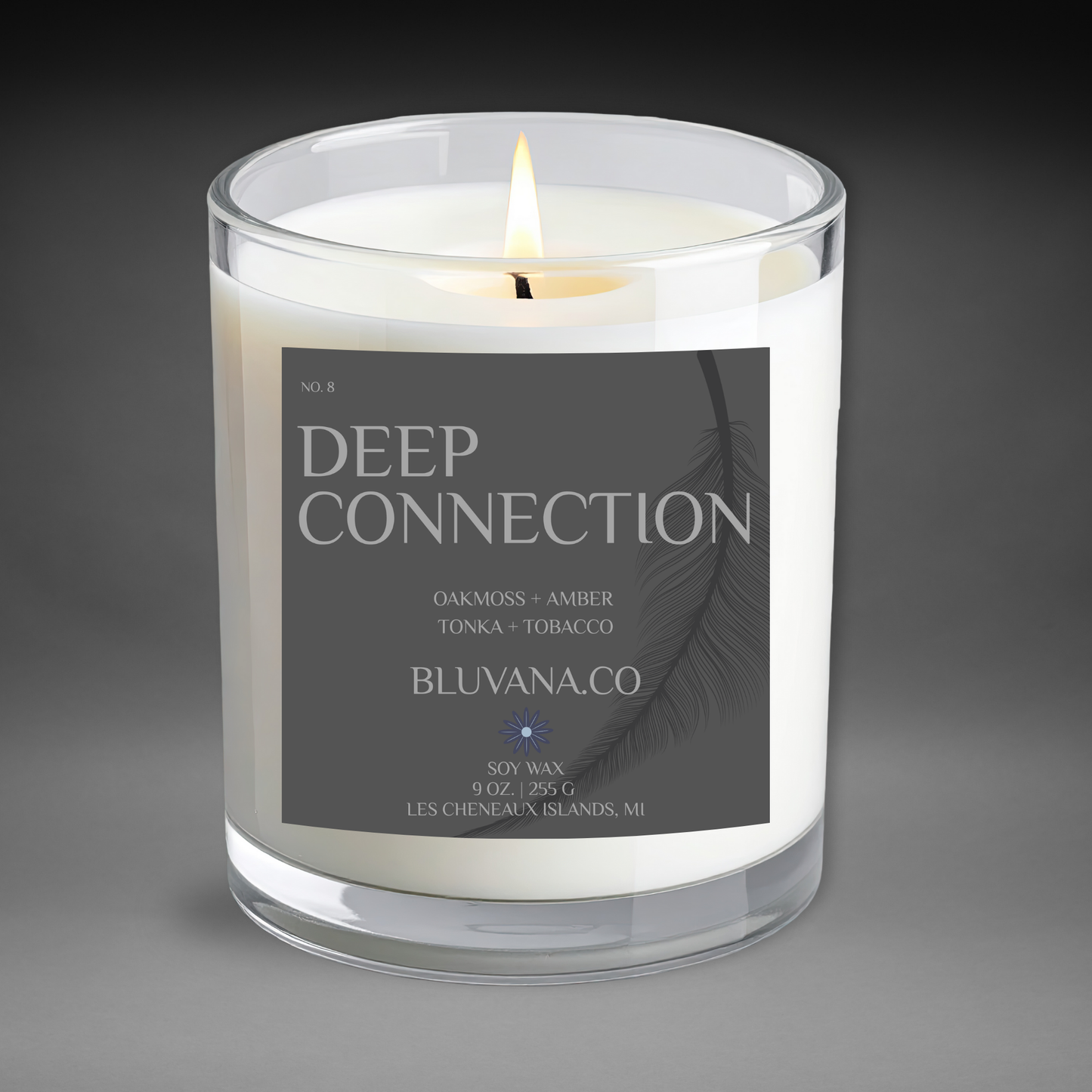 Candle with a label reading 'Deep Connection' by BLUVANA.CO on a dark background