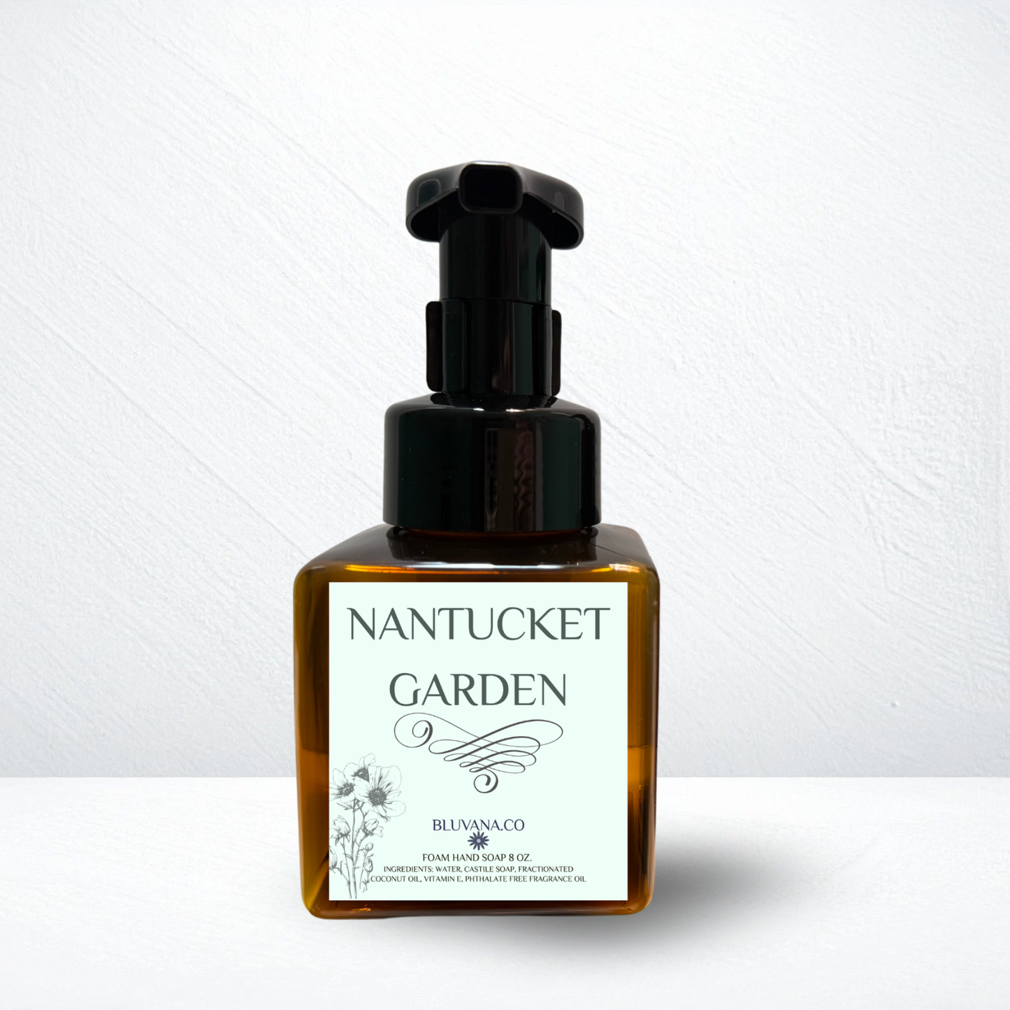 Bottle of Nantucket Garden soap with pump on a white background