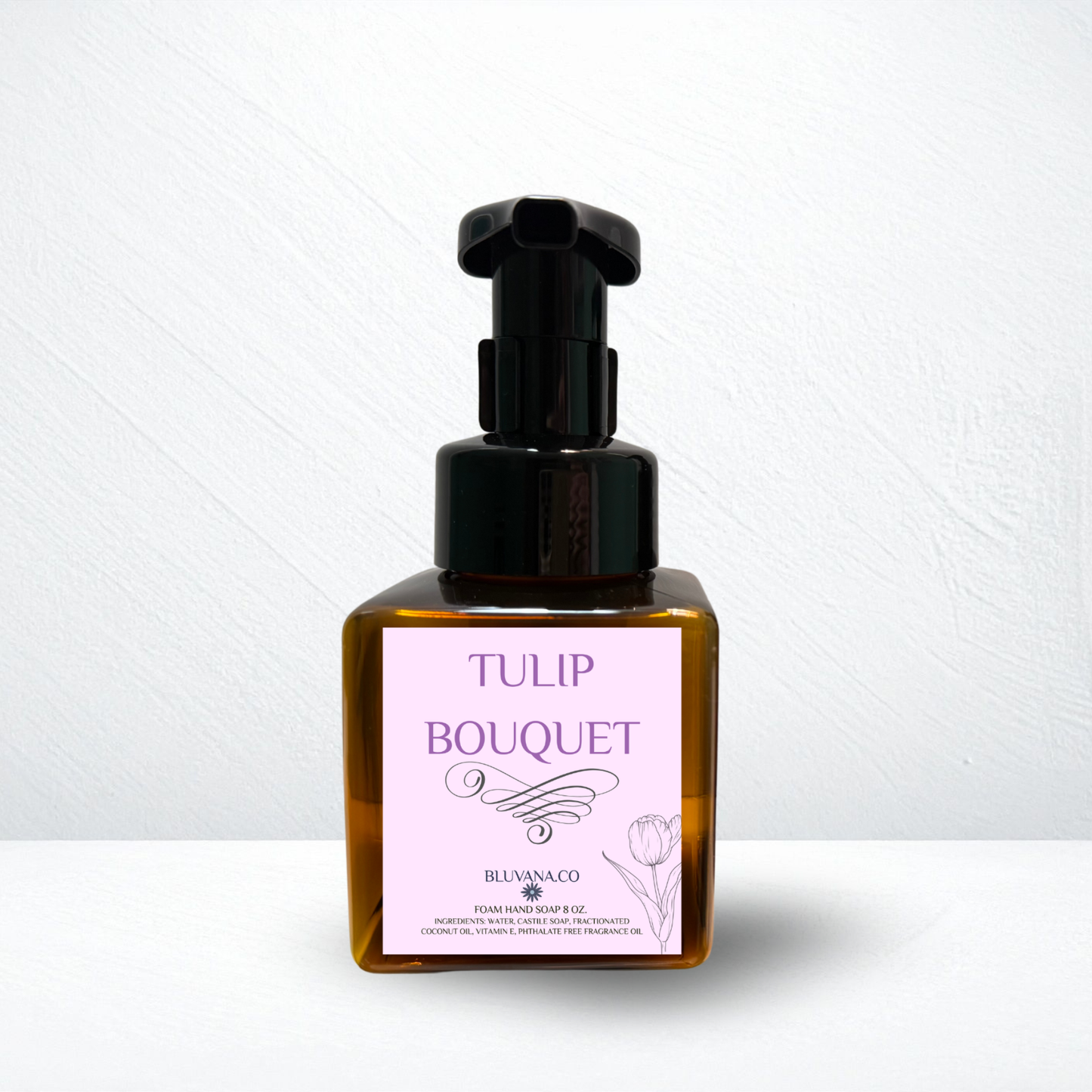 Bottle of Tulip Bouquet product with a black pump on a white background