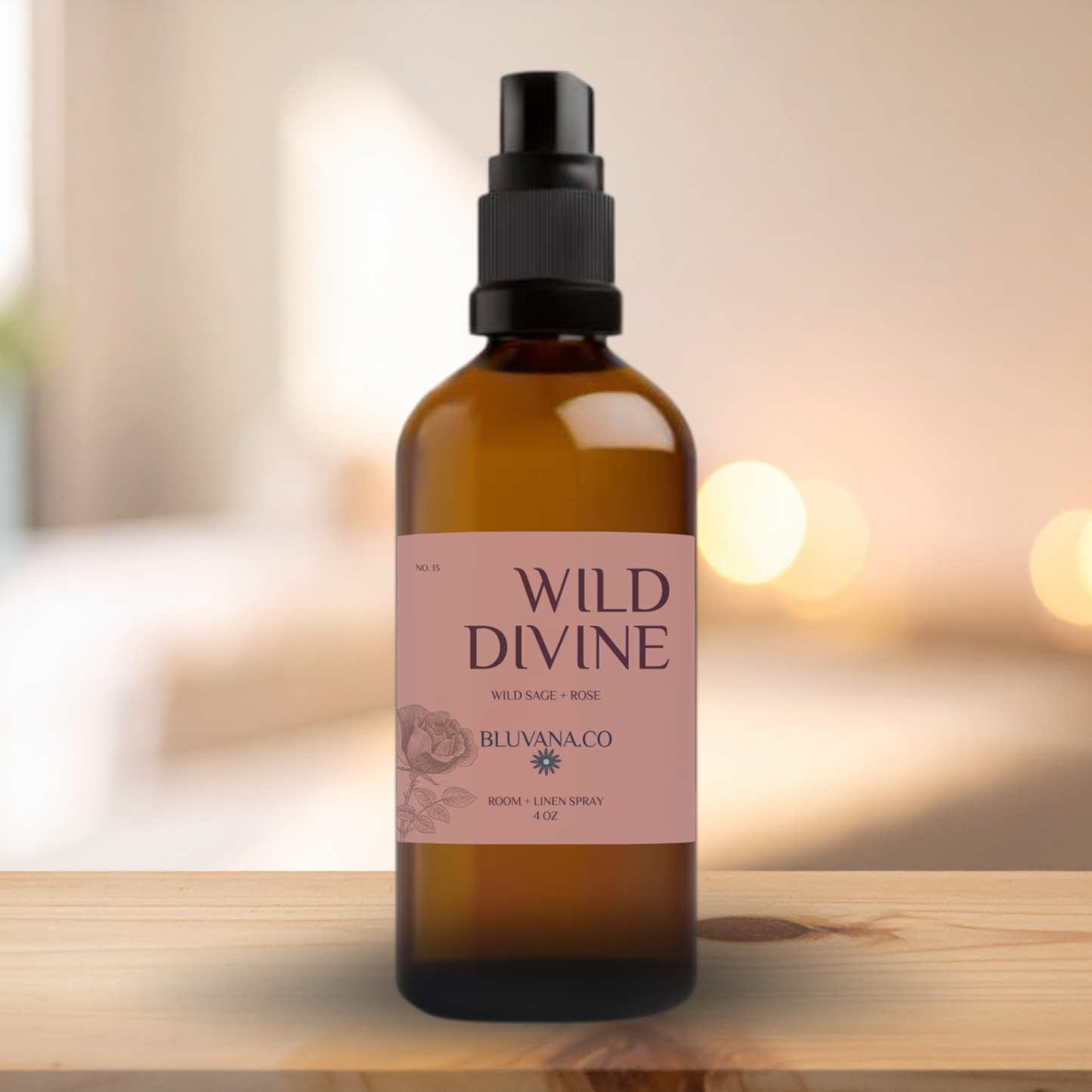 Bottle of Wild Divine body spray on a wooden surface with a blurred background