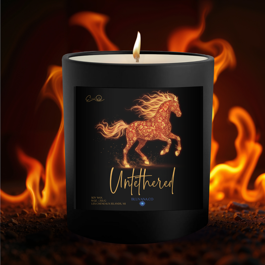 Candle with a horse design on the label against a fiery background