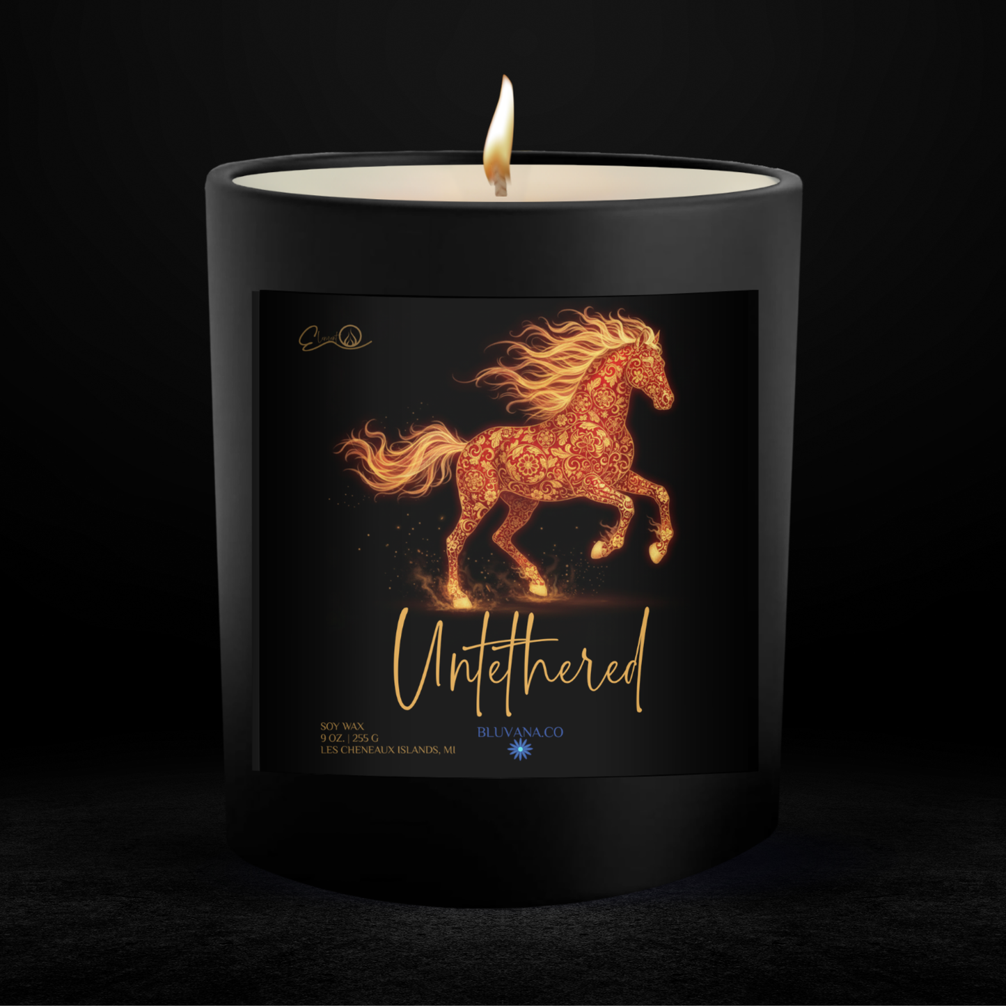 Candle with a horse design on the label against a black background