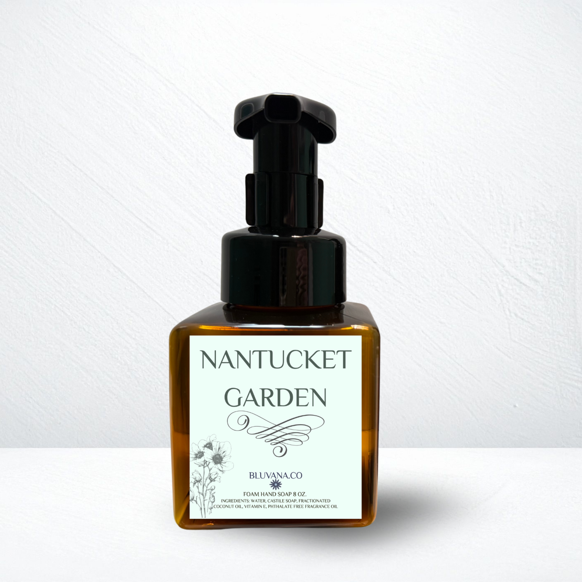 Bottle of Nantucket Garden soap with pump on a white background