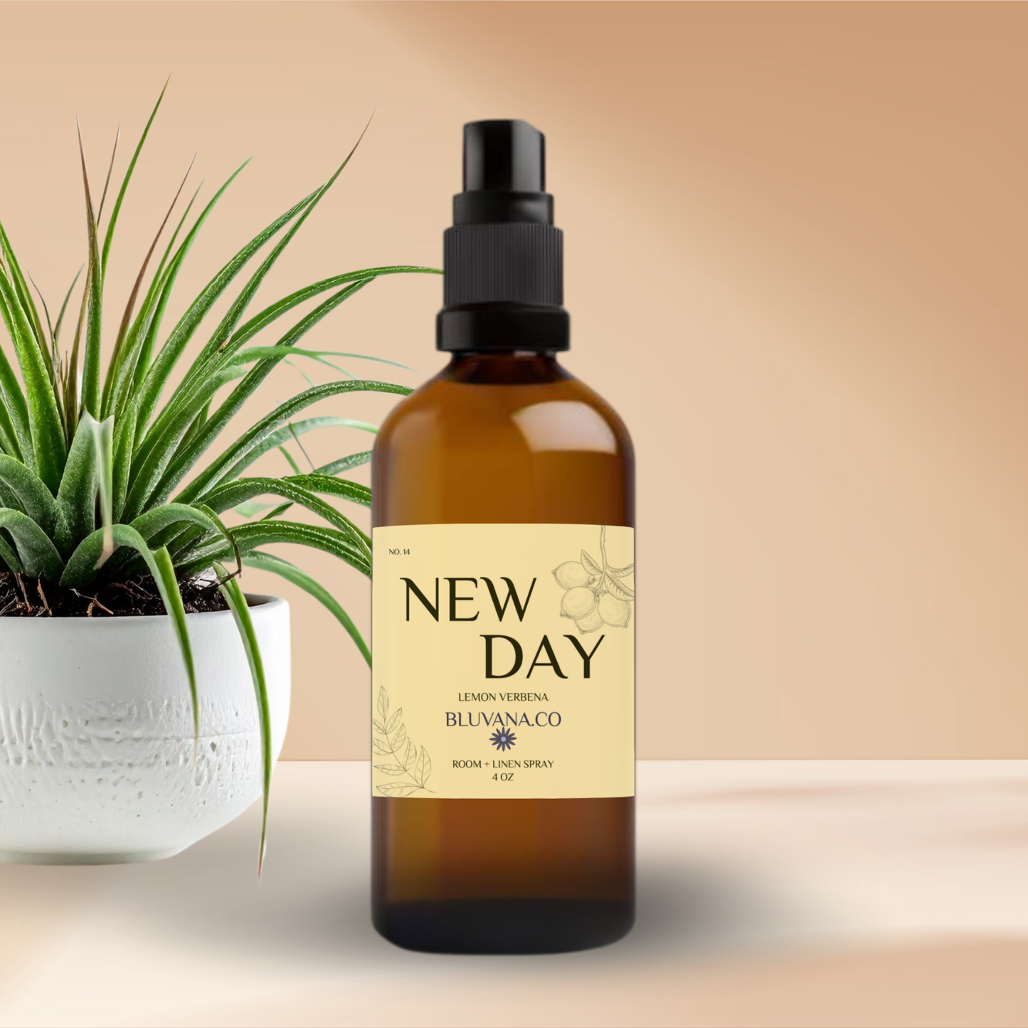 Amber bottle of room spray that has a yellow label on it that says New Day