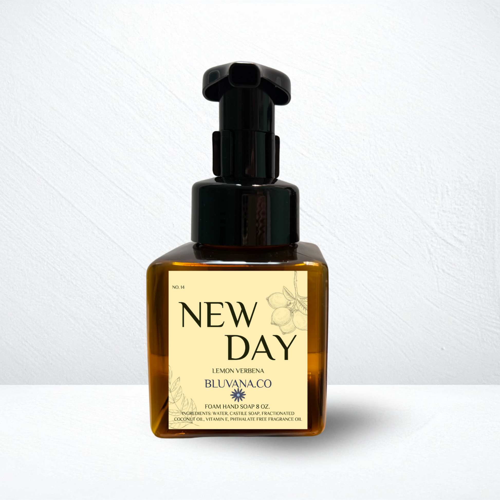 Bottle of 'New Day' soap with pump dispenser on a white background
