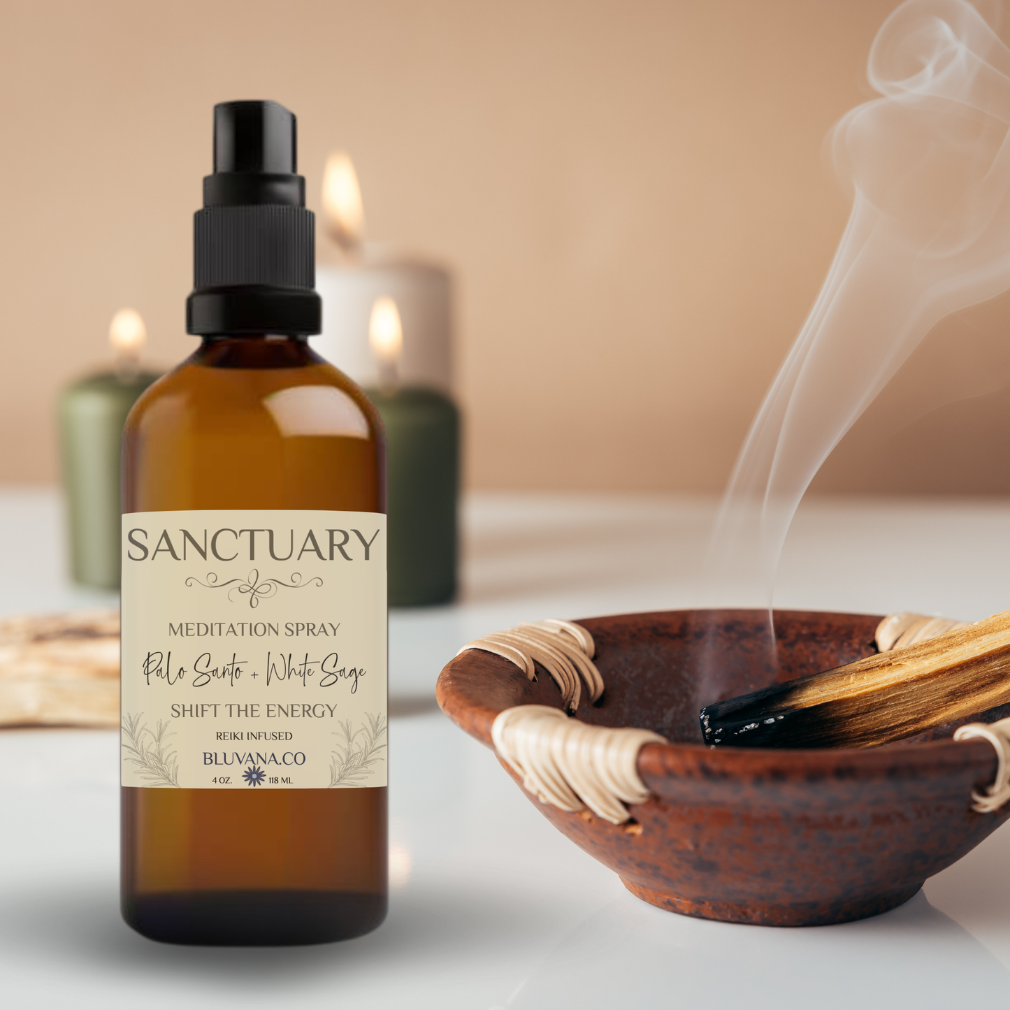 Sanctuary meditation spray bottle with incense and candles in the background