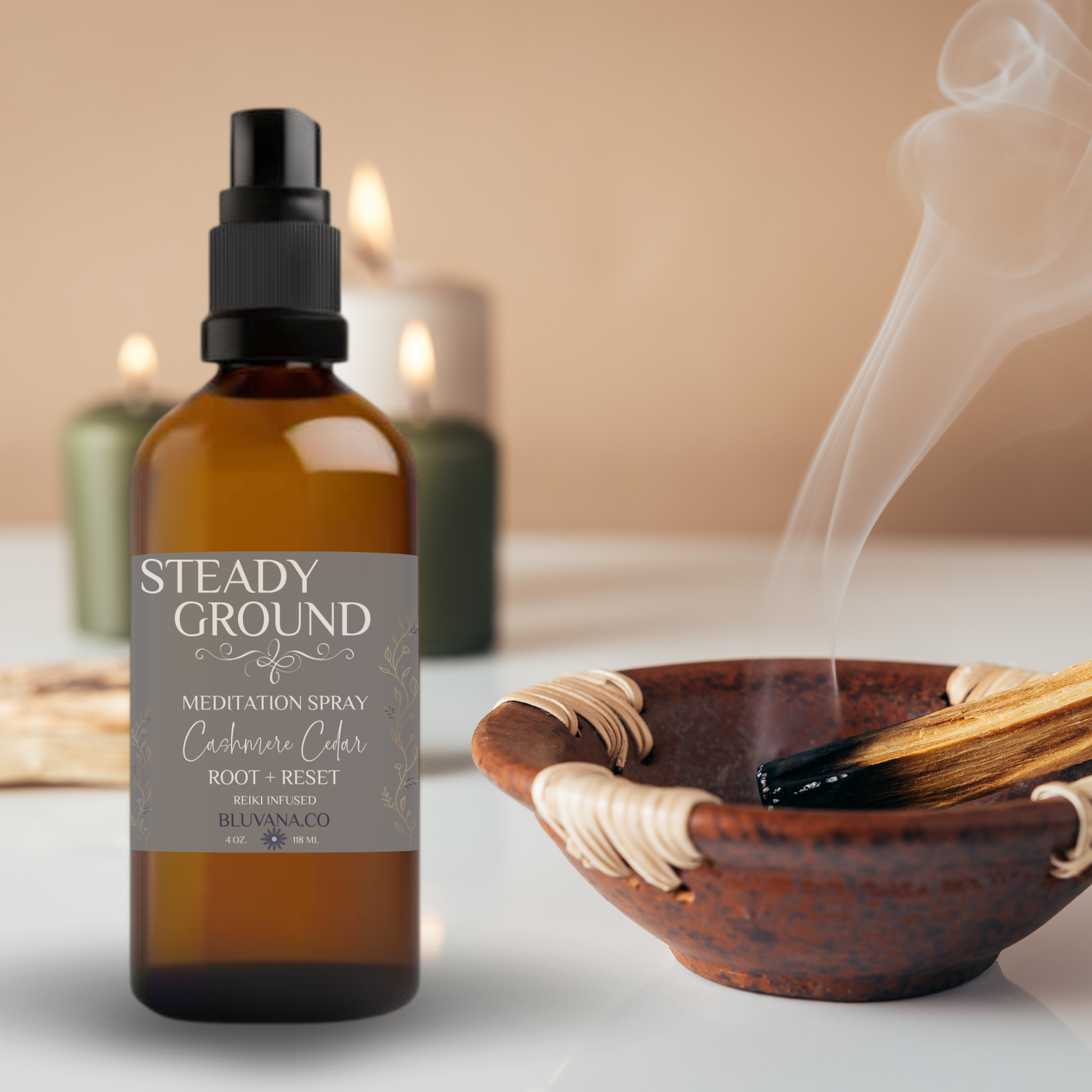 Meditation spray bottle labeled 'Steady Ground' with a smoking bowl and incense sticks on a neutral background.