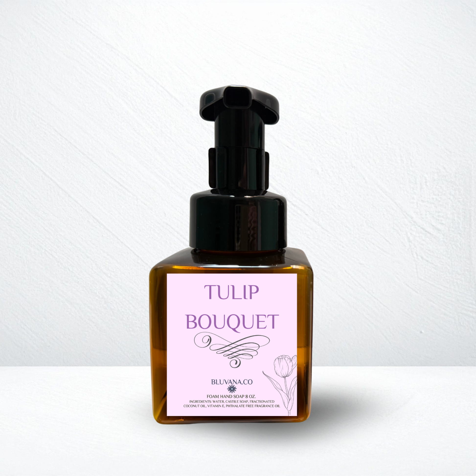Bottle of Tulip Bouquet product with a black pump on a white background