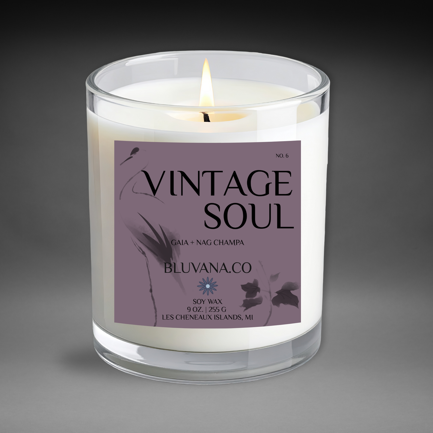 Candle in a glass jar with a 'Vintage Soul' label on a gray background