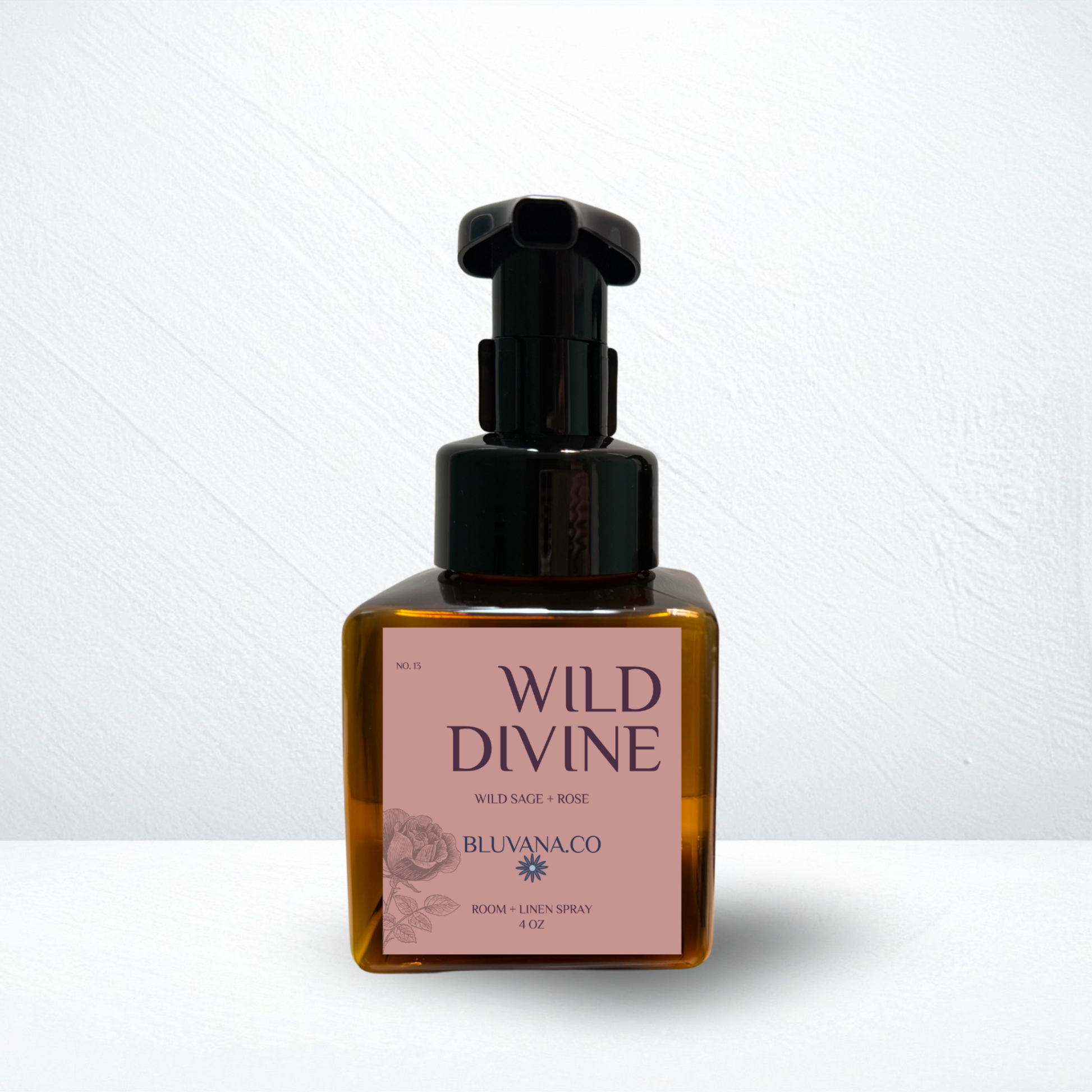 Bottle of Wild Divine product with a pink label on a white background